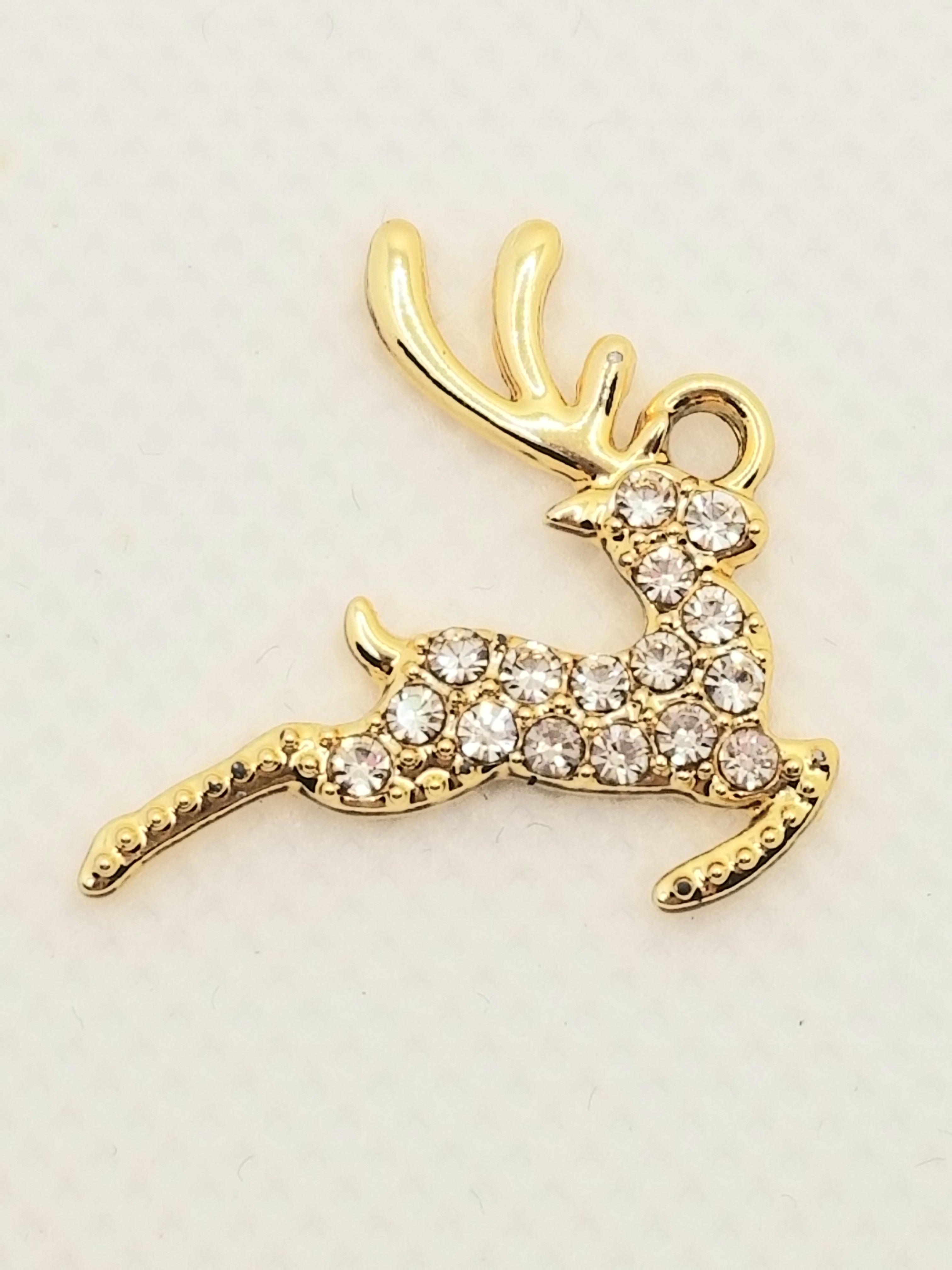 Gold tone reindeer w/sparkly rhinestones Dangle